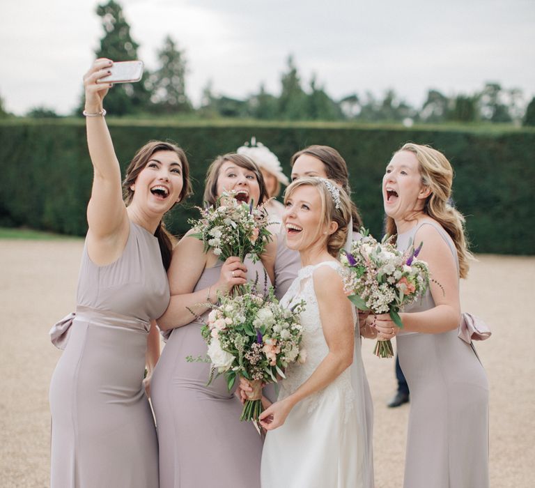 Bridesmaids in Lavender ASOS Dresses | Bride in Pronovias Gown | Elegant, Pastel Wedding at Hedsor House, Buckinghamshire | M & J Photography | Shoot It Yourself Films