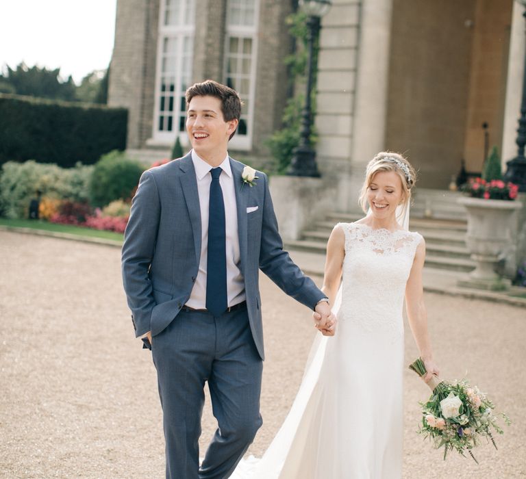 Bride in Pronovias Gown | Groom in Navy J.Crew Suit | Elegant, Pastel Wedding at Hedsor House, Buckinghamshire | M & J Photography | Shoot It Yourself Films