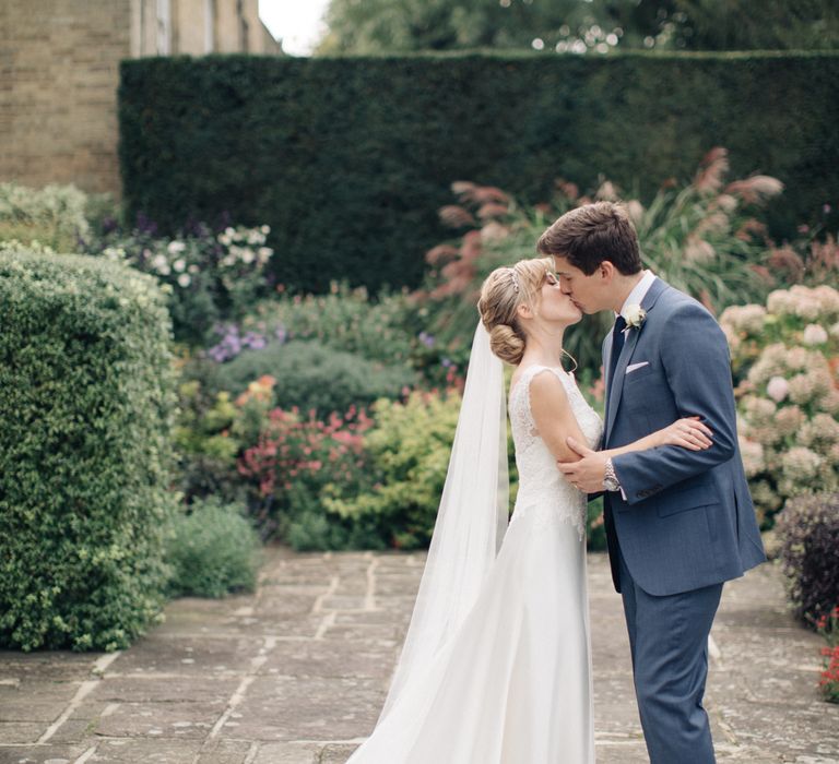 Bride in Pronovias Gown | Groom in Navy J.Crew Suit | Elegant, Pastel Wedding at Hedsor House, Buckinghamshire | M & J Photography | Shoot It Yourself Films