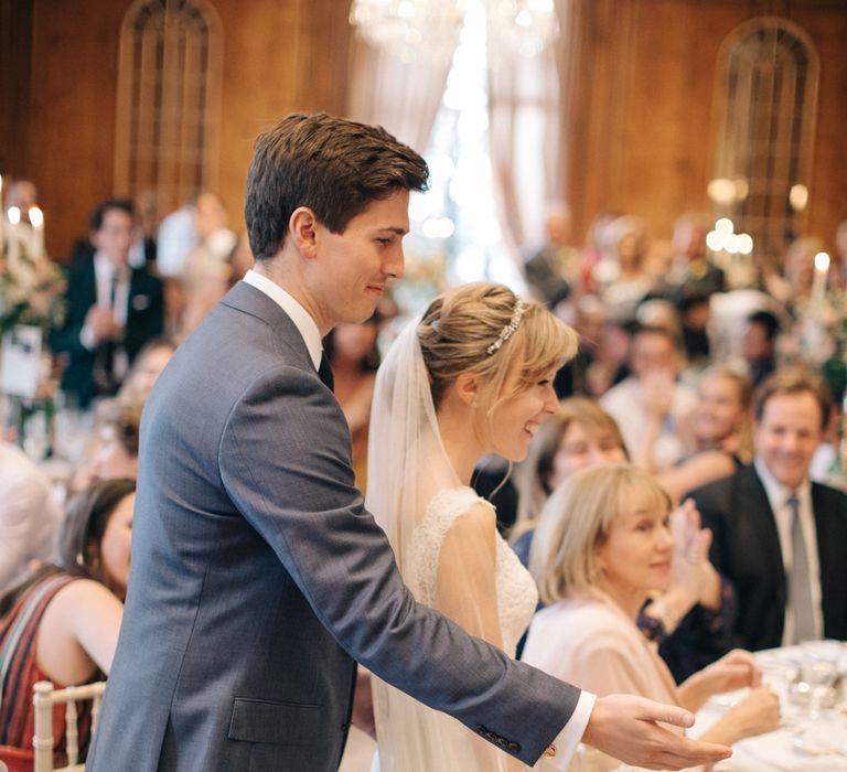 Cutting The Cake | Bride in Pronovias Gown | Groom in Navy J.Crew Suit | Elegant, Pastel Wedding at Hedsor House, Buckinghamshire | M & J Photography | Shoot It Yourself Films