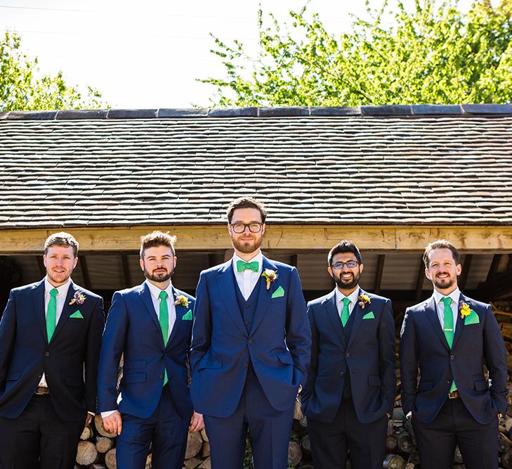 Groom & Groomsmen in Navy With Green Bowties