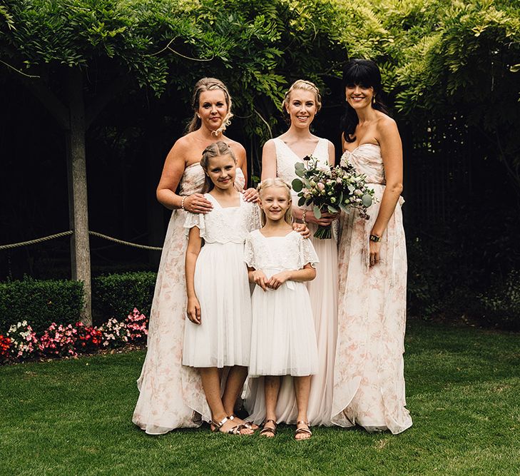 Bridesmaids in Floral Jenny Yoo Dresses from Coco and Kate Boutique