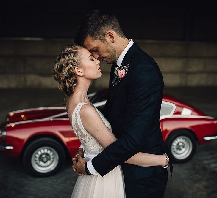 Bride in Catherine Deane Tamsin Wedding Dress & Groom in Paul Smith Suit