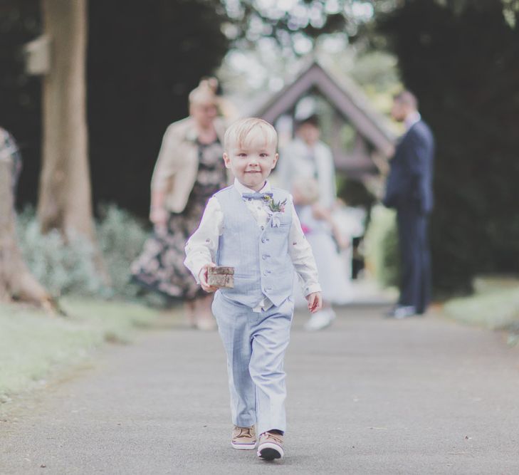 Page Boy in Pale Blue Trousers, Waistcoat & Bow Tie