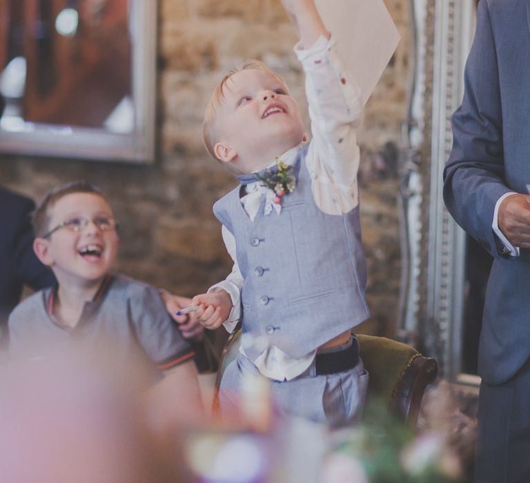 Page Boy in Pale Blue Waistcoat & Bow Tie