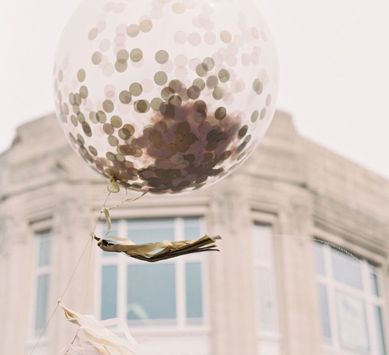 Giant Confetti Filled Balloon with Tissue Tassel | Classic Wedding at Trafalgar Tavern, Greenwich, London | Ann-Kathrin Koch Photography