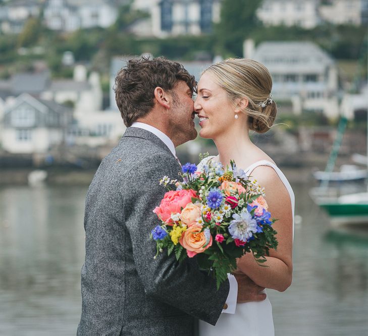 Bride & Groom Portrait with Bright Bouquet