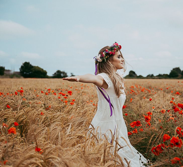 Bride In Poppy Field