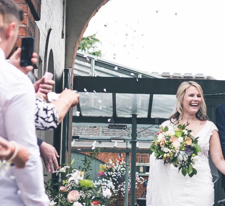 Confetti Moment | Bride in Lace The Signature Collection Bridal Gown from Wed2b | Groom in Limehaus Suit | Classic Wedding at The Mytton & Mermaid, Atcham | Willo Photography