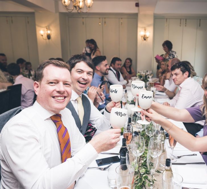 Wedding Guests with Personalised Goblet Wedding Favours | Classic Wedding at The Mytton & Mermaid, Atcham | Willo Photography