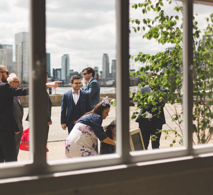 Fabulous London Riverside Venue Chainstore at Trinity Buoy Wharf. Watters Wedding Dress, Images by Kirsty Mackenzie Photography.