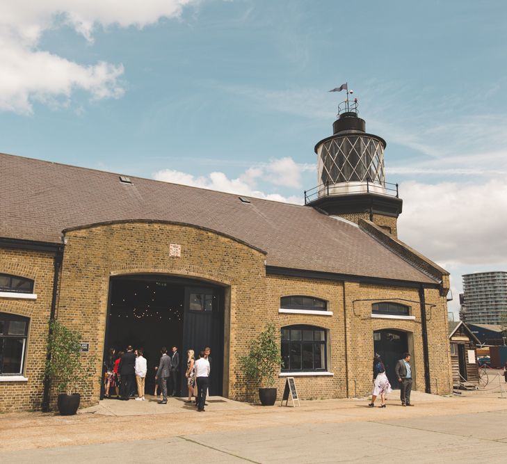 Fabulous London Riverside Venue Chainstore at Trinity Buoy Wharf. Watters Wedding Dress, Images by Kirsty Mackenzie Photography.