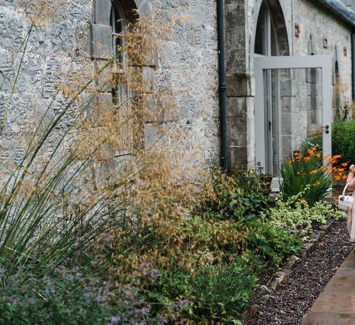 Flower Girls In Peach Dresses // Rainy Tipi Wedding At The Coach House at Kinross House Scotland With Bride In Embellished Bespoke Dress And Images From Photos By Zoe