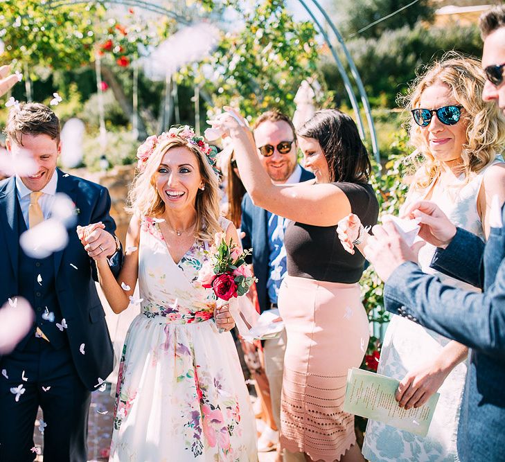 Confetti Moment | Bride in Charlotte Balbier Untamed Love Floral Wedding Dress | Groom in Navy Ted Baker Suit | Destination Wedding at Casa Cornacchi in Italy | Albert Palmer Photography