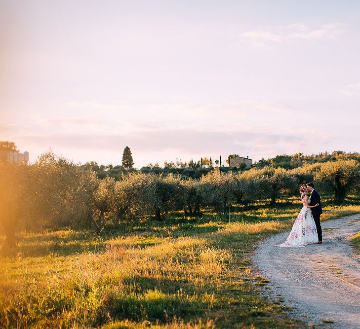 Bride in Charlotte Balbier Untamed Love Floral Wedding Dress | Groom in Navy Ted Baker Suit | Destination Wedding at Casa Cornacchi in Italy | Albert Palmer Photography