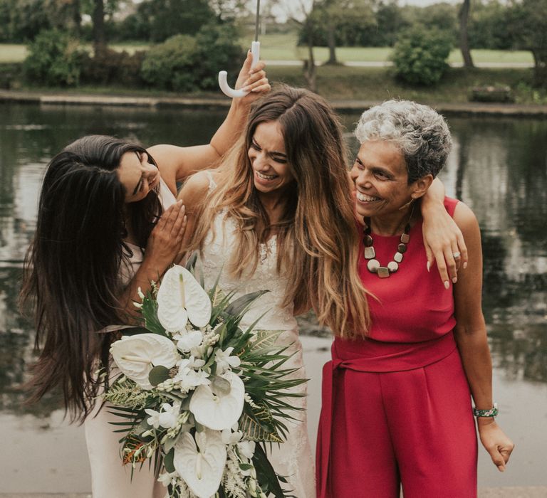 Young & Vibrant Wedding At Wylam Brewery With Bridesmaids In Metallic Satin Jumpsuits & A Tropical Palm Print Theme With Images From Nataly J