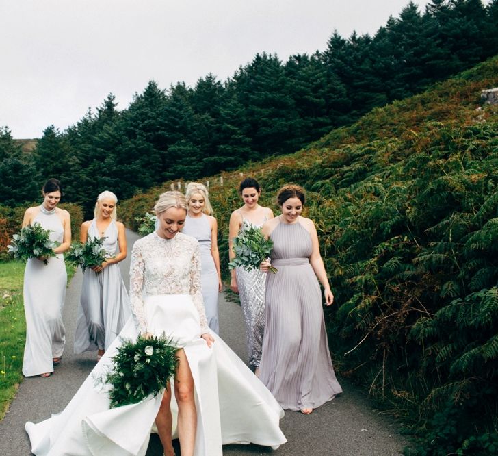 Bride in Emma Beaumont Wedding Dress with Grey Bridesmaids