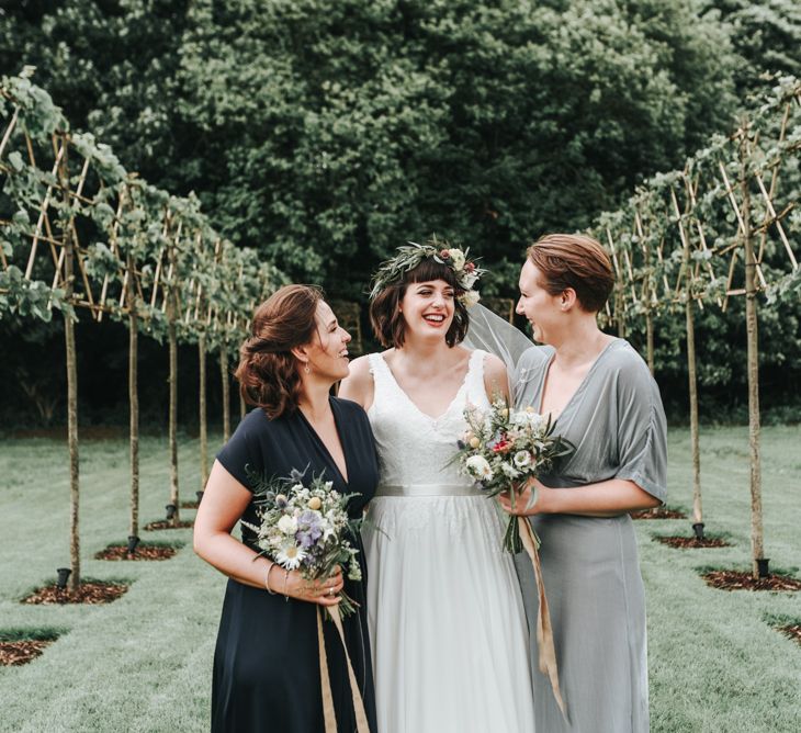 Bridesmaid In Navy & Grey Dresses