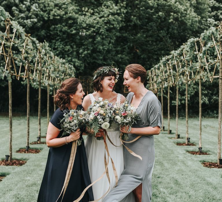 Bridesmaid In Navy & Grey Dresses