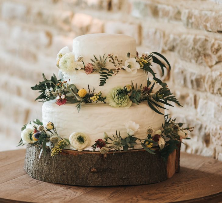 White Wedding Cake With Foliage & Fresh Flowers