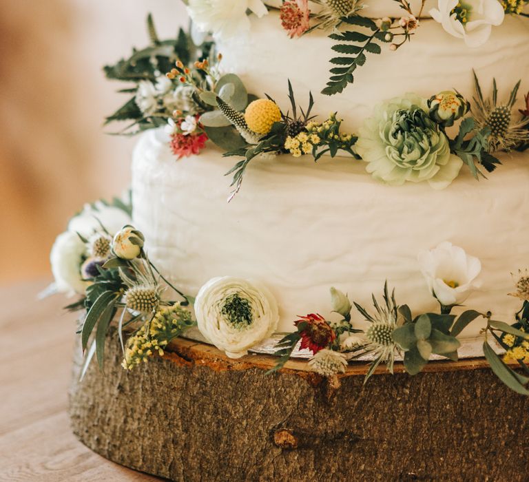 White Wedding Cake With Foliage & Fresh Flowers