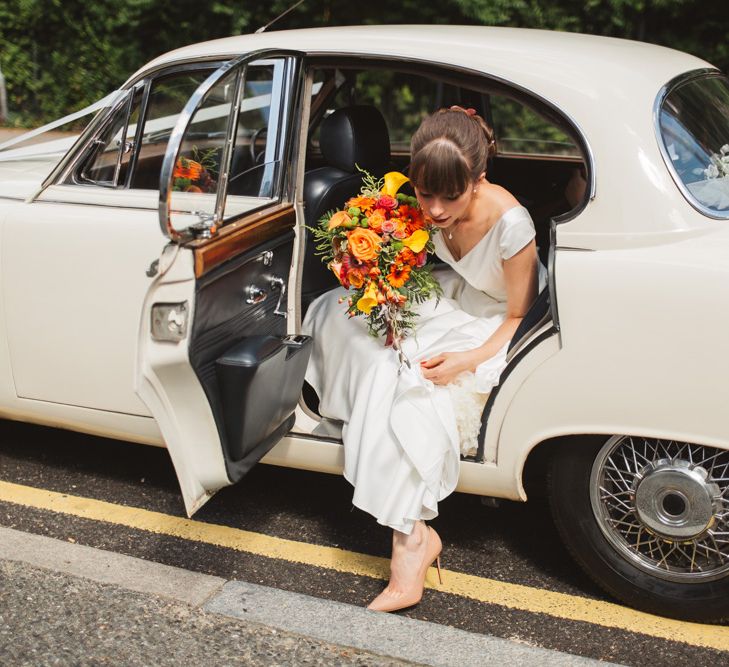 50s Inspired Bride With Orange Bouquet