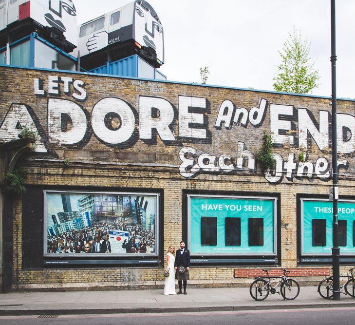 Halfpenny London Bride For An Intimate Wedding At Perseverance Works Shoreditch With Groom & Groomsmen In Kilts And Images From Adam Cherry Photography