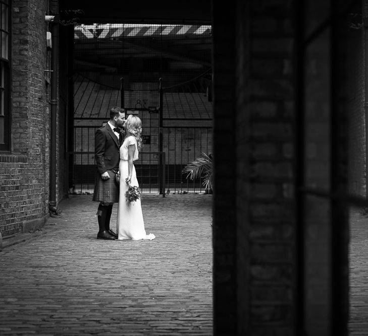 Halfpenny London Bride For An Intimate Wedding At Perseverance Works Shoreditch With Groom & Groomsmen In Kilts And Images From Adam Cherry Photography