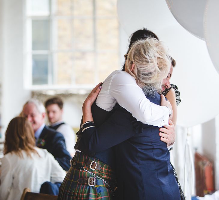 Halfpenny London Bride For An Intimate Wedding At Perseverance Works Shoreditch With Groom & Groomsmen In Kilts And Images From Adam Cherry Photography