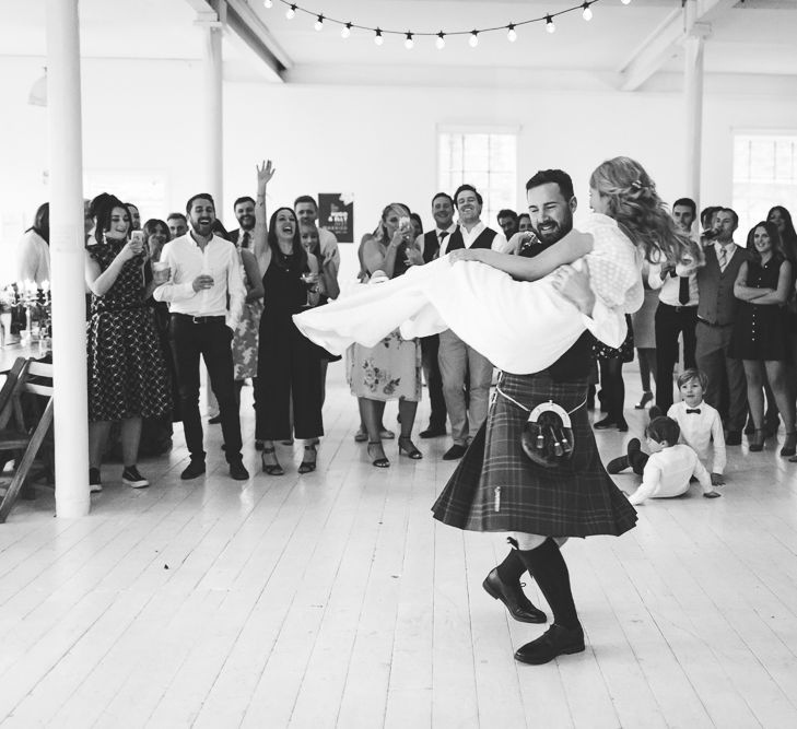 Halfpenny London Bride For An Intimate Wedding At Perseverance Works Shoreditch With Groom & Groomsmen In Kilts And Images From Adam Cherry Photography