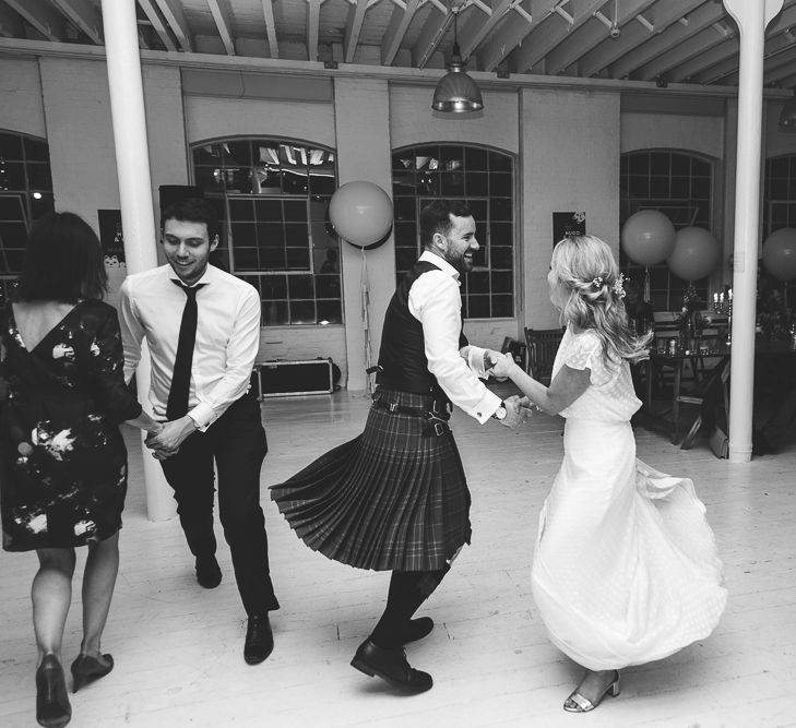 Halfpenny London Bride For An Intimate Wedding At Perseverance Works Shoreditch With Groom & Groomsmen In Kilts And Images From Adam Cherry Photography