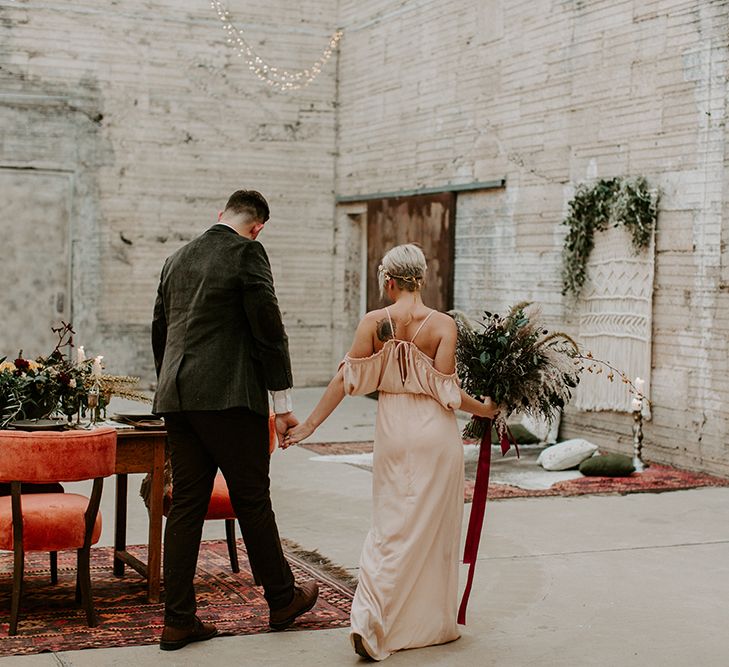 Industrial Bohemian Chic Inspiration by Simple Means Events | Rich Autumnal Flowers & Macrame Wall Hanging Decor | Erika Greene Photography