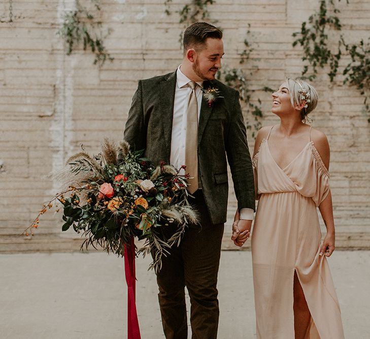 Industrial Bohemian Chic Inspiration by Simple Means Events | Rich Autumnal Flowers & Macrame Wall Hanging Decor | Erika Greene Photography