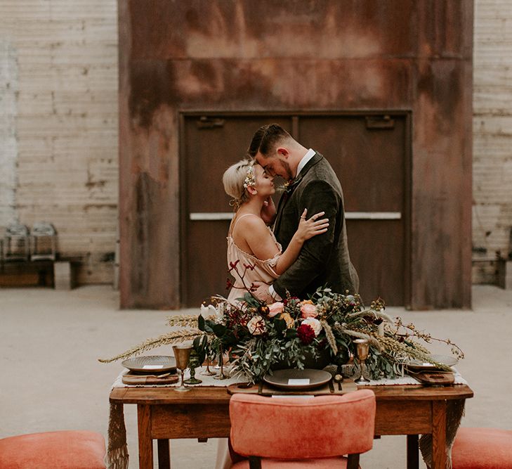 Industrial Bohemian Chic Inspiration by Simple Means Events | Rich Autumnal Flowers & Macrame Wall Hanging Decor | Erika Greene Photography