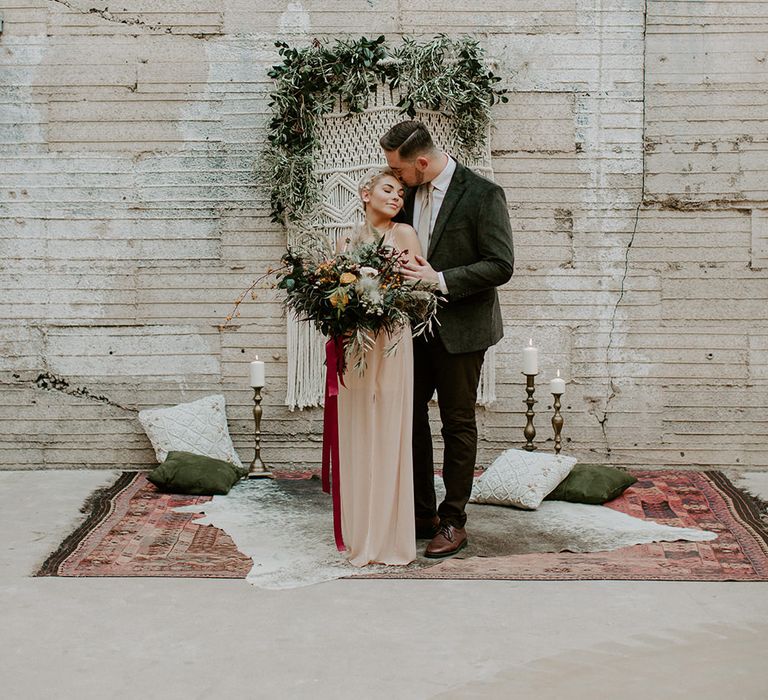 Industrial Bohemian Chic Inspiration by Simple Means Events | Rich Autumnal Flowers & Macrame Wall Hanging Decor | Erika Greene Photography