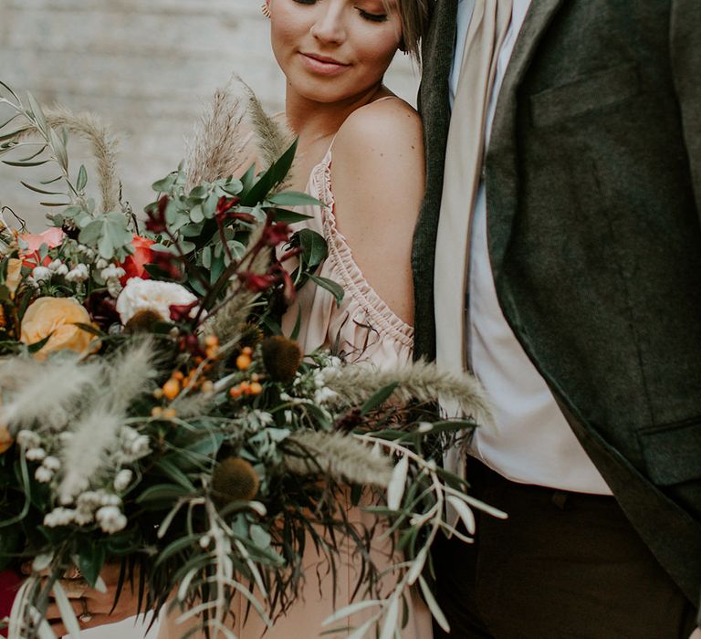 Industrial Bohemian Chic Inspiration by Simple Means Events | Rich Autumnal Flowers & Macrame Wall Hanging Decor | Erika Greene Photography