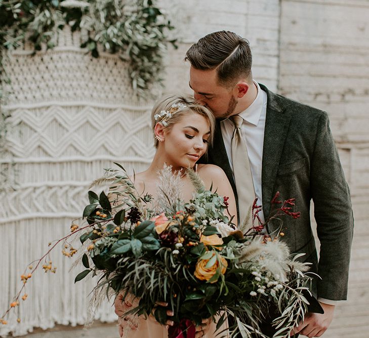 Industrial Bohemian Chic Inspiration by Simple Means Events | Rich Autumnal Flowers & Macrame Wall Hanging Decor | Erika Greene Photography