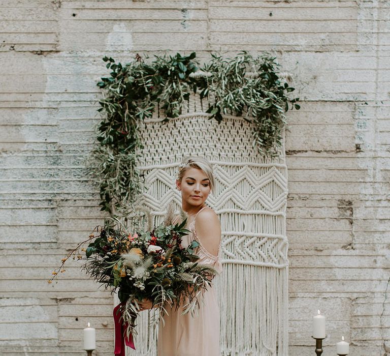 Industrial Bohemian Chic Inspiration by Simple Means Events | Rich Autumnal Flowers & Macrame Wall Hanging Decor | Erika Greene Photography