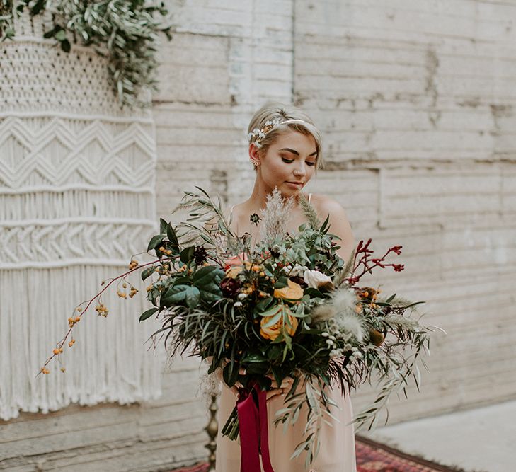 Industrial Bohemian Chic Inspiration by Simple Means Events | Rich Autumnal Flowers & Macrame Wall Hanging Decor | Erika Greene Photography