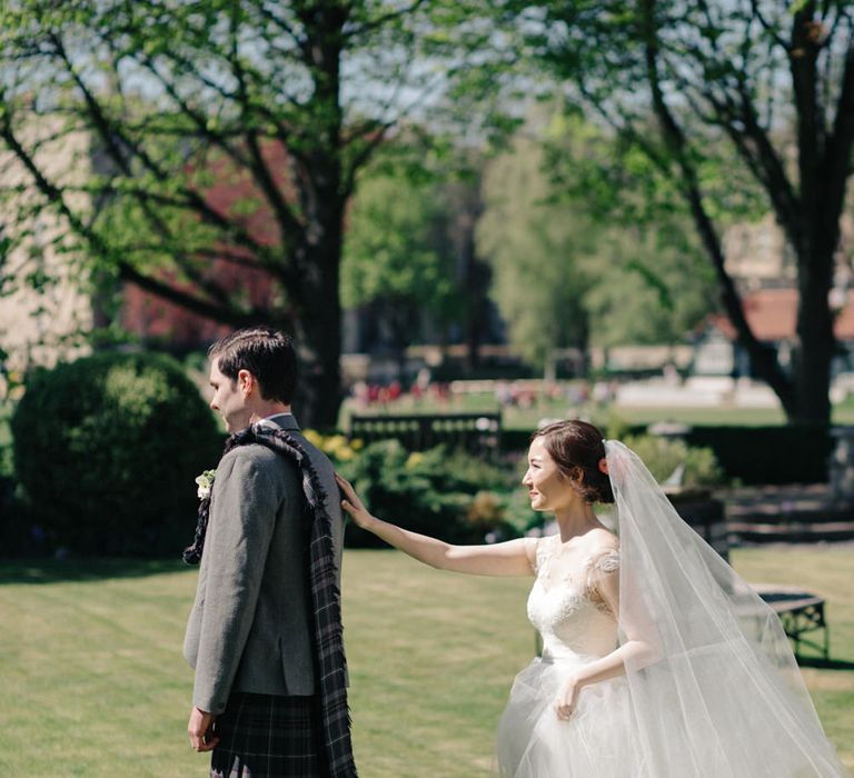 First Look | Bride in Bespoke Illusion Neck Gown | Groom in Tartan Kilt | M and J Photography