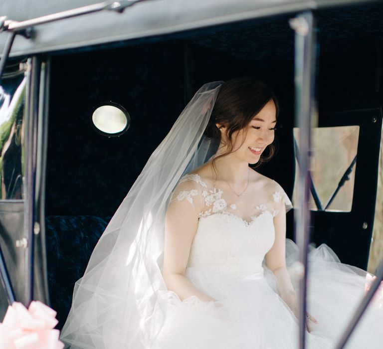 Bride in Bespoke Princess Gown in Horse & Carriage | M and J Photography