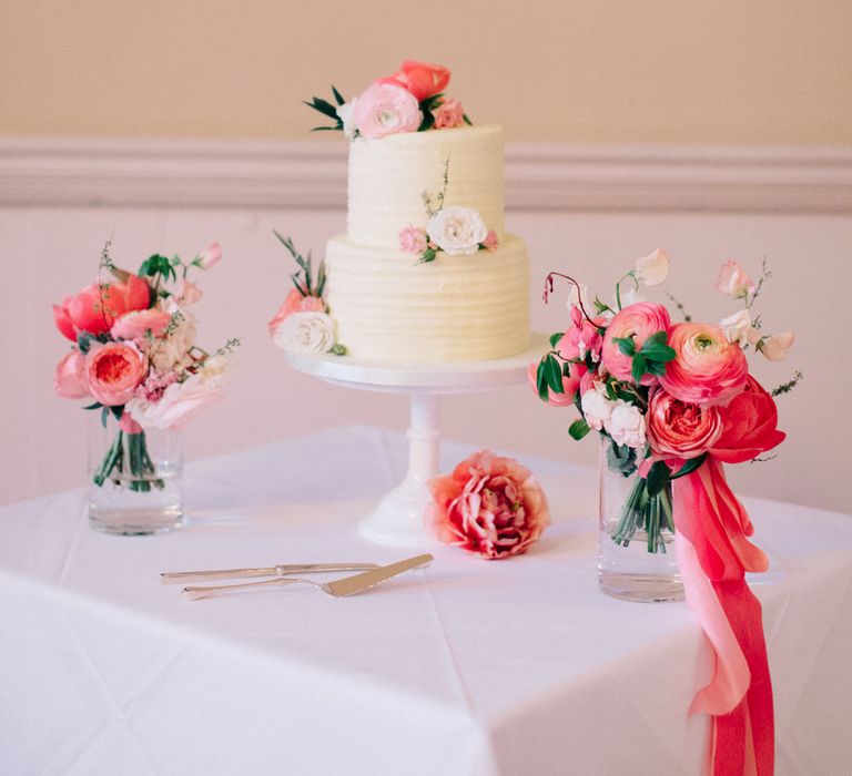 Two Tier Wedding Cake with Coral Peony & Ranunculus Floral Decor | M and J Photography