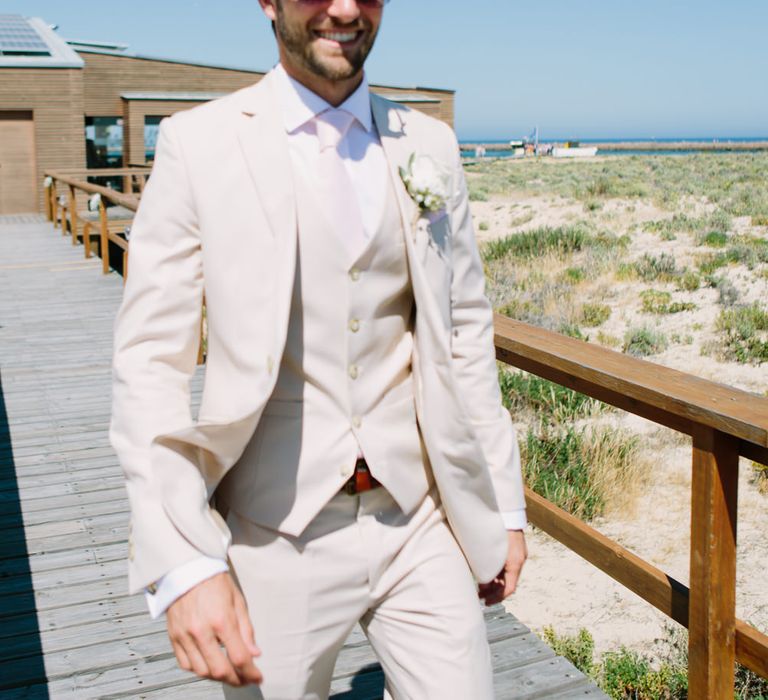 Groom in Beige Three Piece Wedding Suit | Jade Osborne Photography | The Amazing Rabbit Films