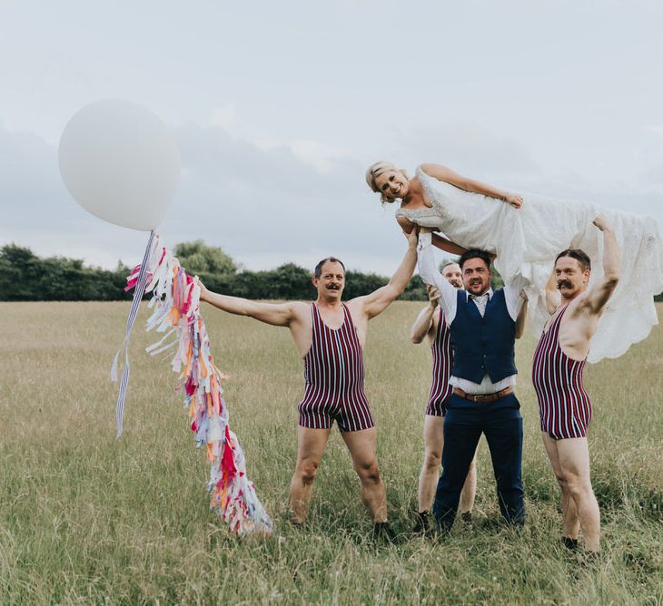 Vintage Circus Themed Wedding At Old Brook Barn Essex With Bride In Ronald Joyce & Images By Kelsie Low Photography