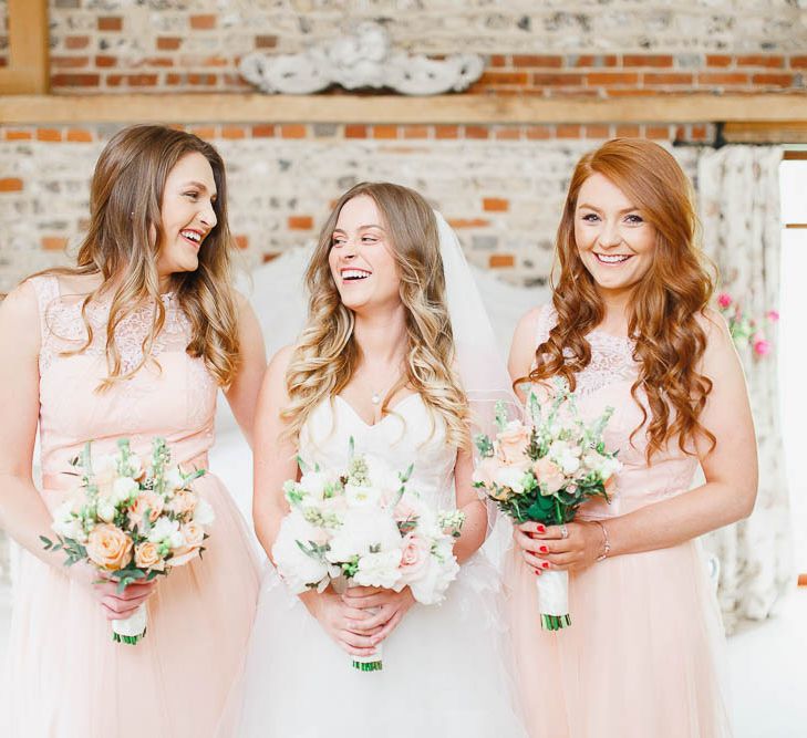 Peach Chi Chi Bridesmaid Dresses | Bride in Warren Watters Gown | White Stag Wedding Photography