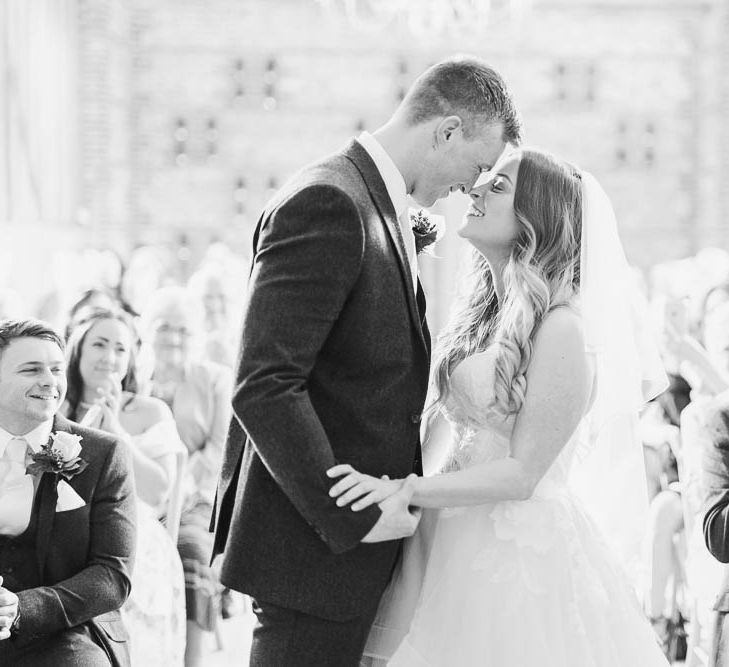 Wedding Ceremony| Bride in Warren Watters Gown | Groom in Marks and Spencer Suit | Peach & White Wedding at Upwaltham Barns | White Stag Wedding Photography