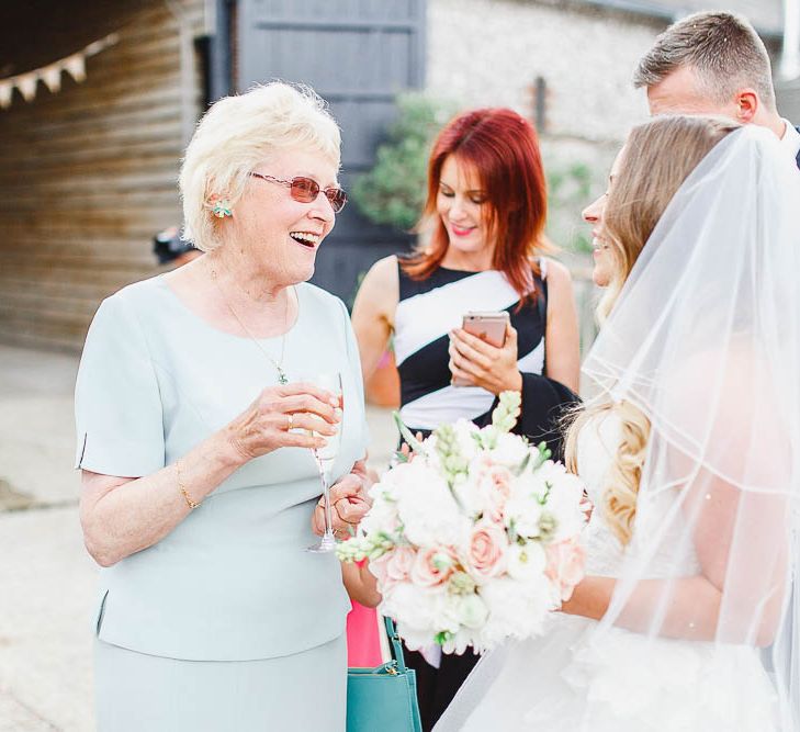 Wedding Guests | Peach & White Wedding at Upwaltham Barns | White Stag Wedding Photography