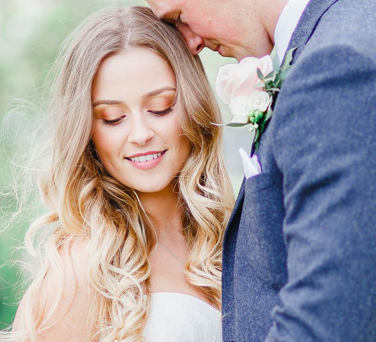 Bride in Warren Watters Gown | Groom in Marks and Spencer Suit | Peach & White Wedding at Upwaltham Barns | White Stag Wedding Photography