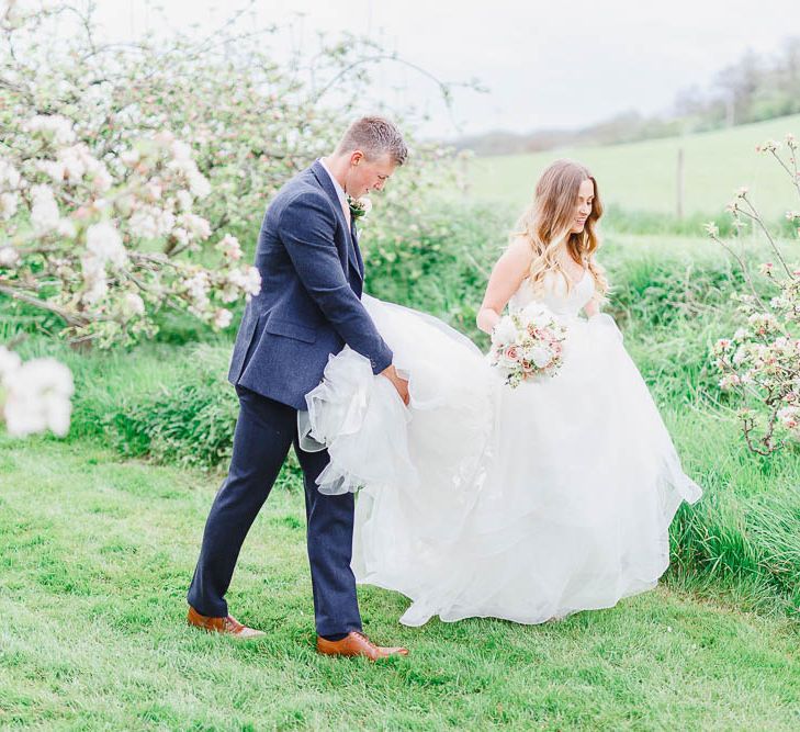 Bride in Warren Watters Gown | Groom in Marks and Spencer Suit | Peach & White Wedding at Upwaltham Barns | White Stag Wedding Photography