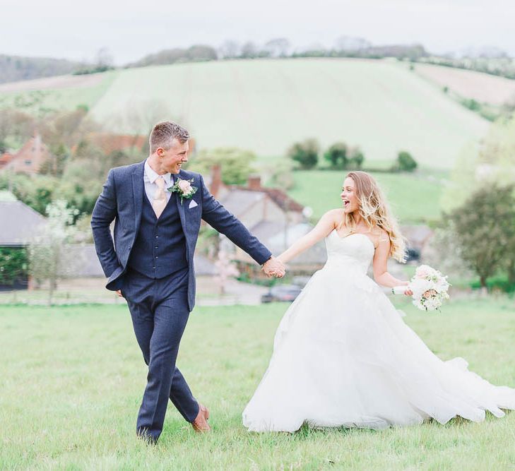 Bride in Warren Watters Gown | Groom in Marks and Spencer Suit | Peach & White Wedding at Upwaltham Barns | White Stag Wedding Photography